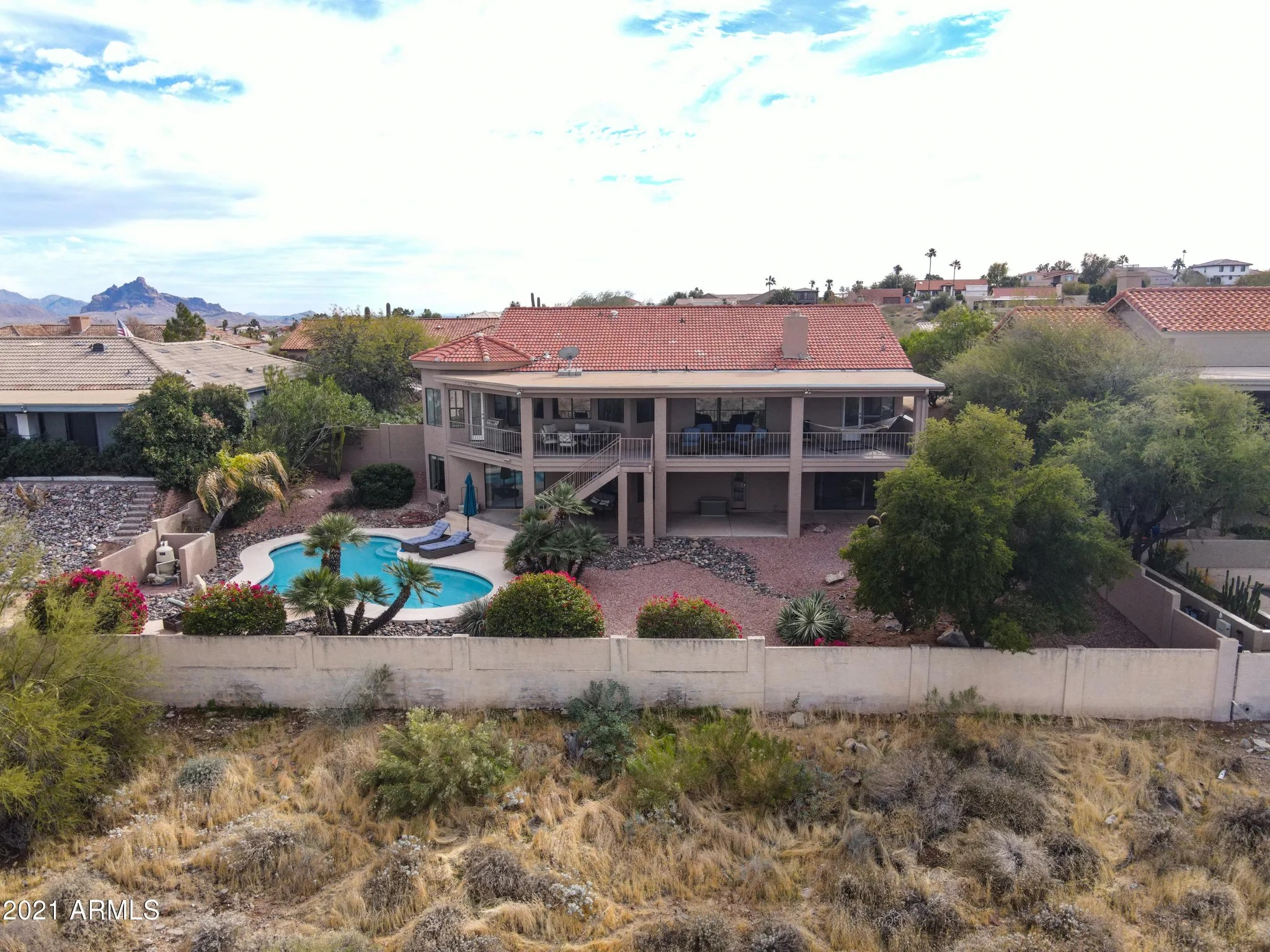 Original 85268 hillside estate prior to structural demolition of upper and lower patios and total backyard elevation re-engineering