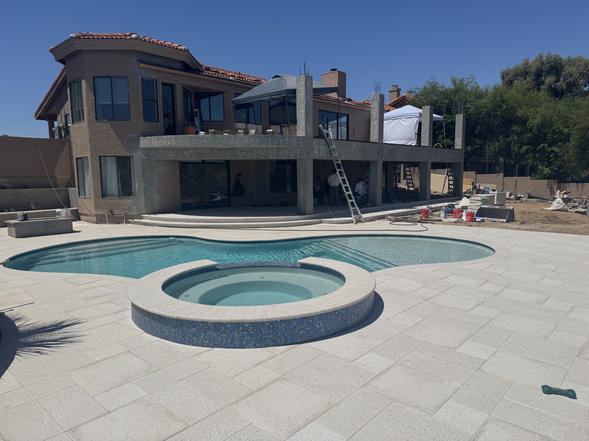 Rebuilding structural multi-level patio support columns and integrated luxury pool environment on a challenging Fountain Hills hillside lot.