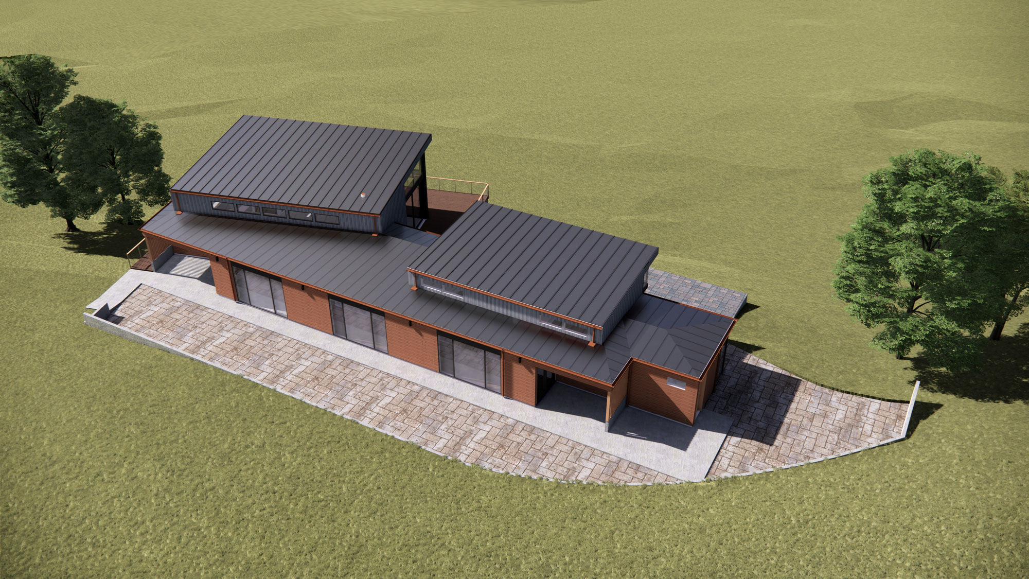 Aerial view of a modern single-story house with flat roofs and large windows surrounded by grassy land.