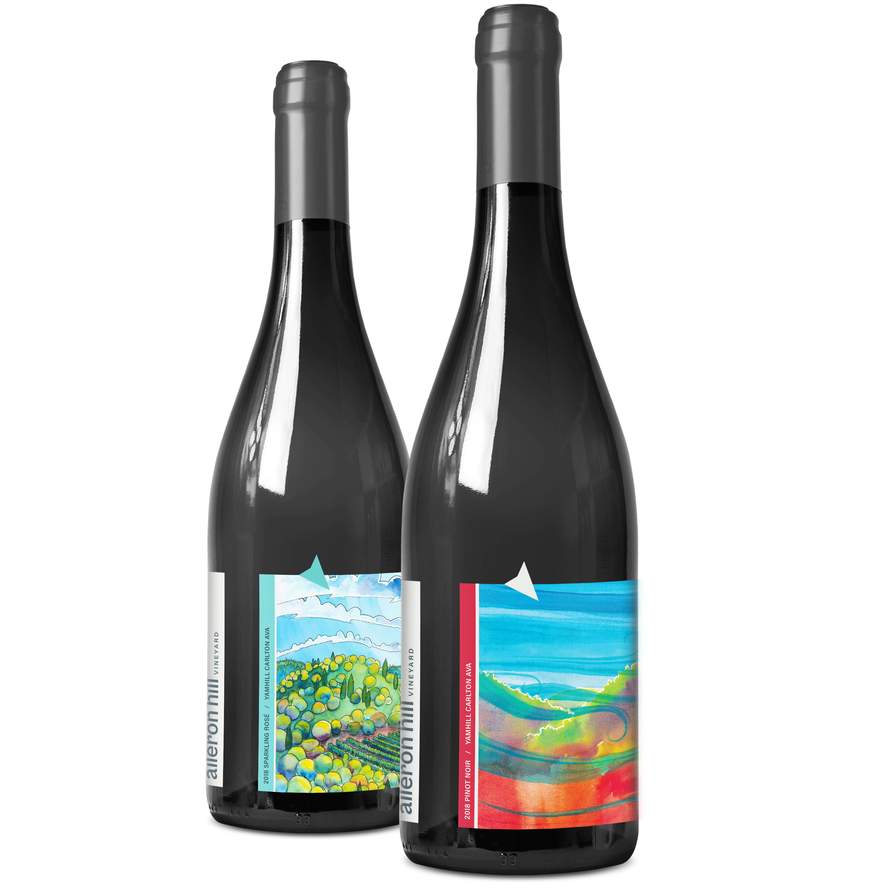 Two wine bottles with colorful landscape labels from Aileron Hill Vineyard, Yamhill Carlton AVA.
