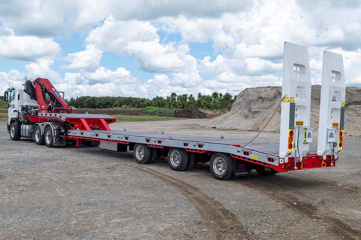 3 axle semi transporter rear angle view