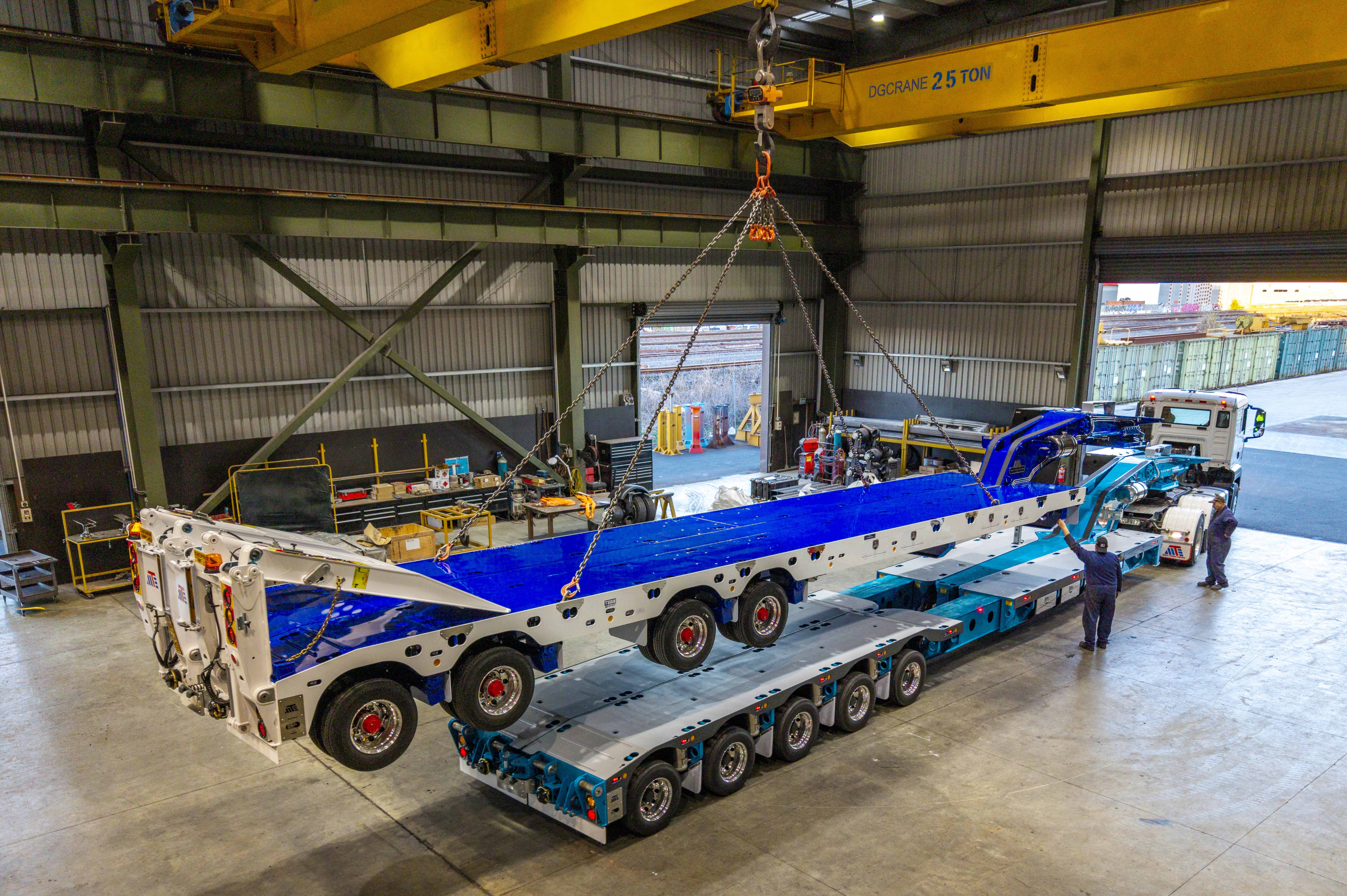 4R4 Full Widener & 5R8 Extendable Linkwing being loaded in workshop