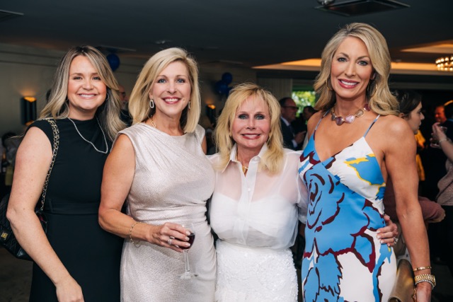 Four guests pose together during the cocktail hour of the 2025 Rey of Hope Gala