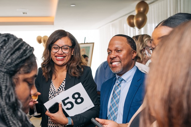 Guests at the 2025 Rey of Hope Gala socialize during cocktail hour