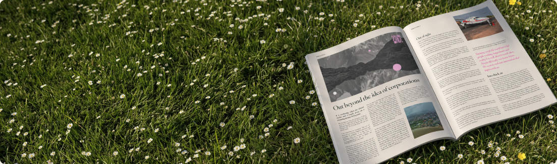An open issue of Rewild Magazine lying in the grass