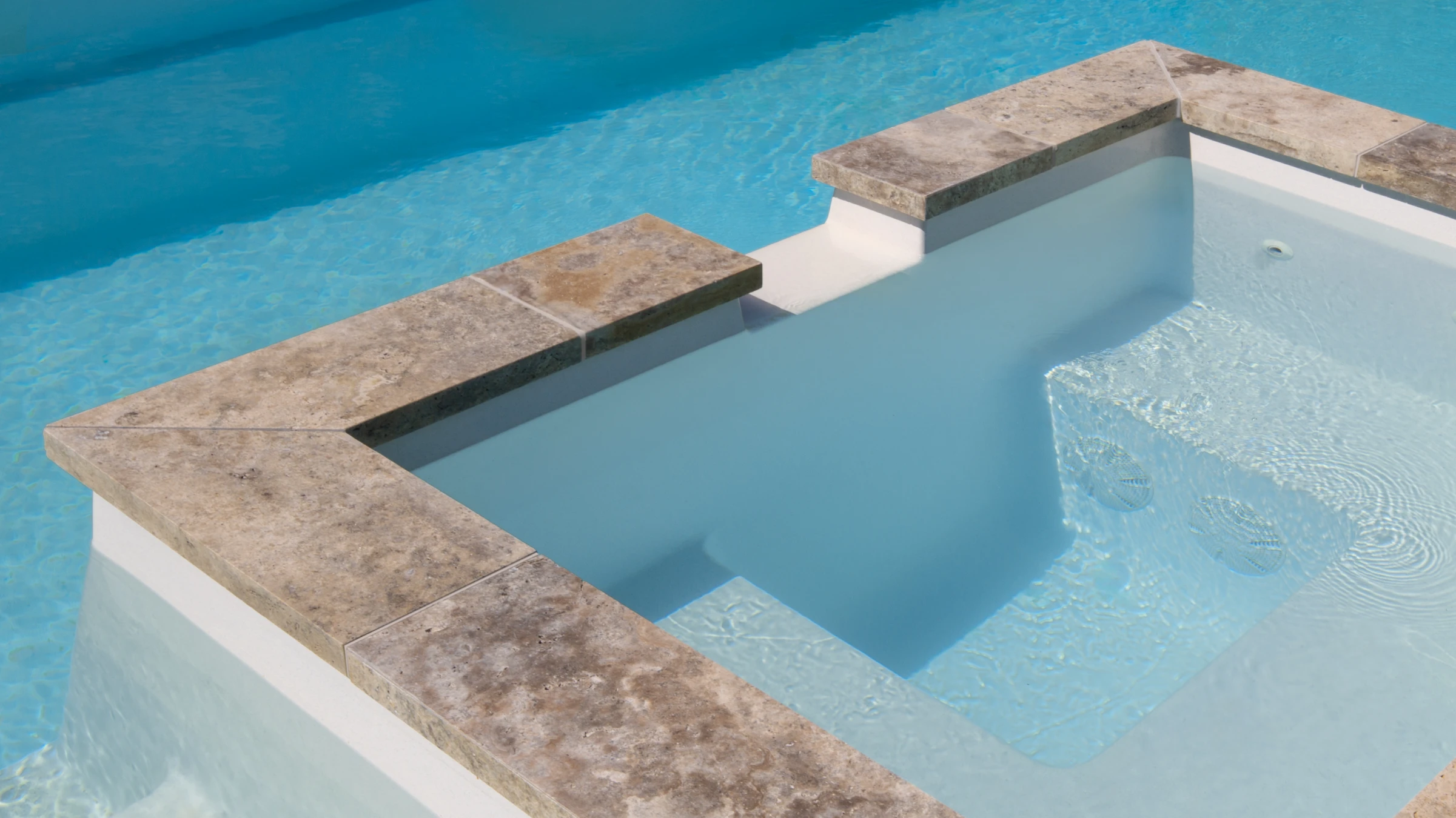 Close up shot of the Peninsula pool and spa combination from Summertime