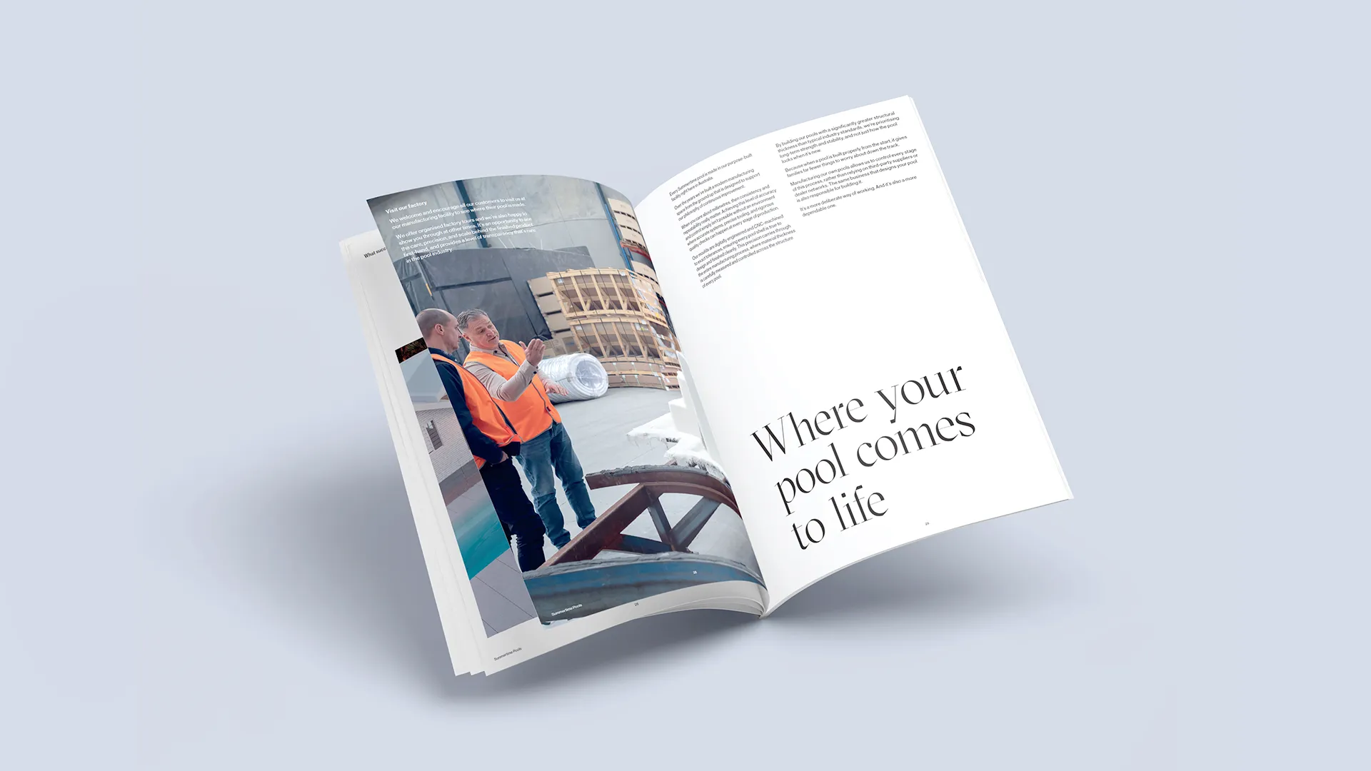 Open magazine spread shows two men with orange vests talking near pool construction materials.