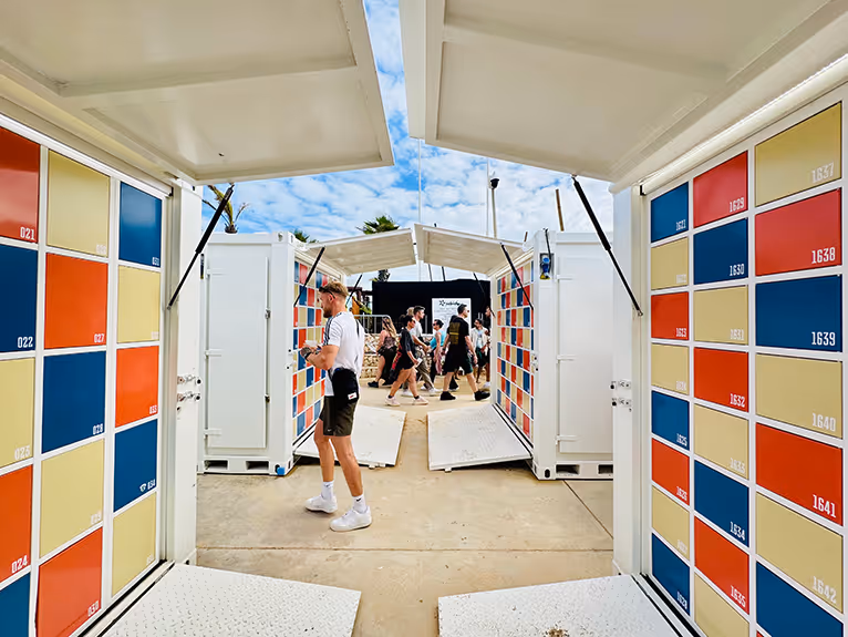 A view through the colorful lockers from Mobile Locker on a festival