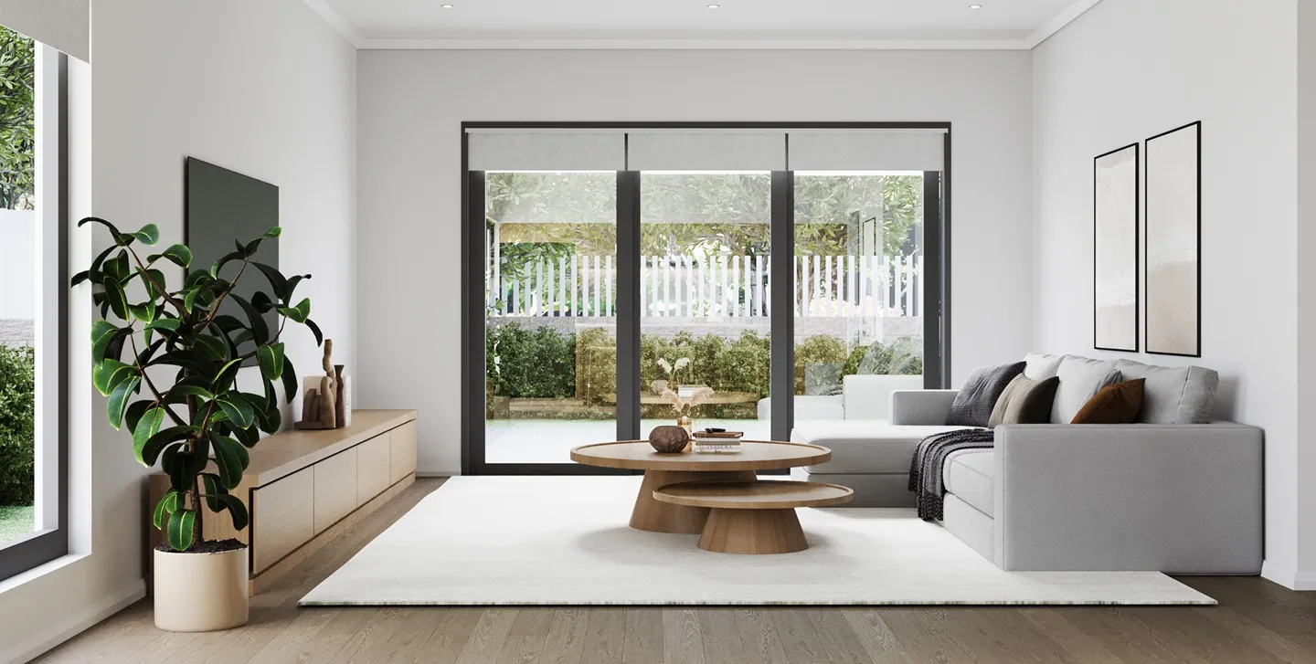 A living room with a couch, coffee table and sliding glass doors.