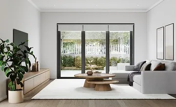 A living room with a couch, coffee table and sliding glass doors.