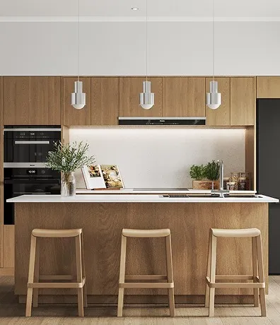 A kitchen with two stools next to a counter.