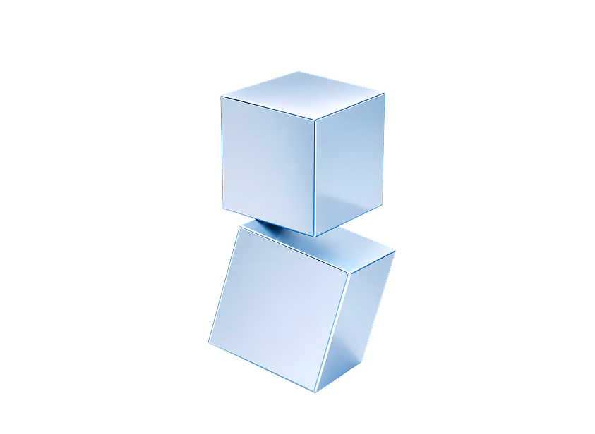 Deux cubes métalliques brillants l’un au-dessus de l’autre sur fond noir.