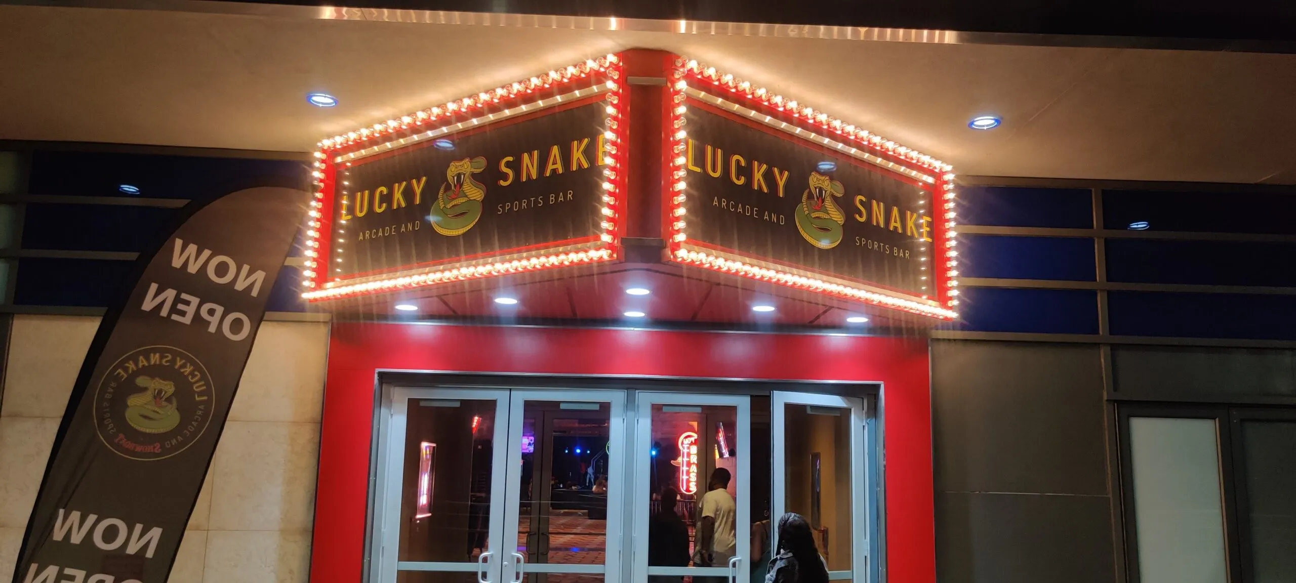 Martino Lucky Snake Sports Bar and Arcade exterior signs and awnings in Philadelphia