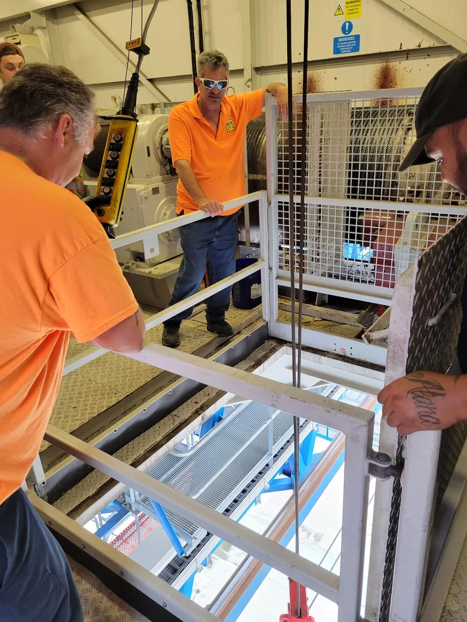 Martino Signs indoor and outdoor workshop in Philadelphia, PA with workers