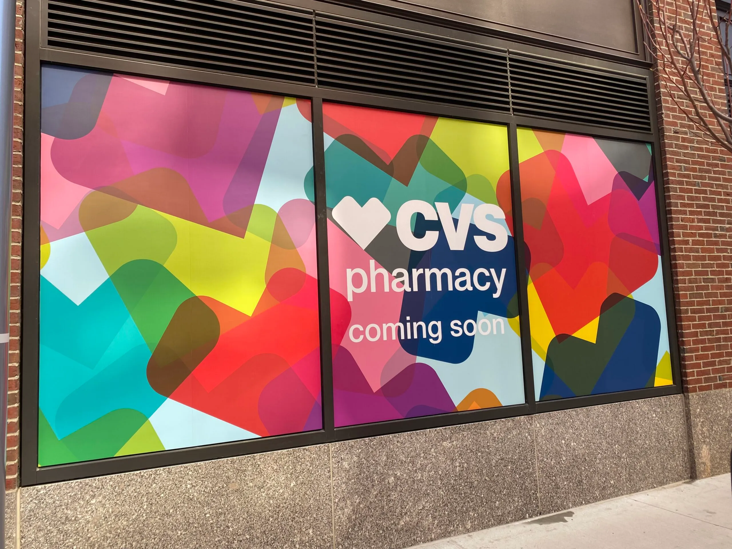 Martino Signs creates colorful CVS pharmacy exterior window awnings in Philadelphia