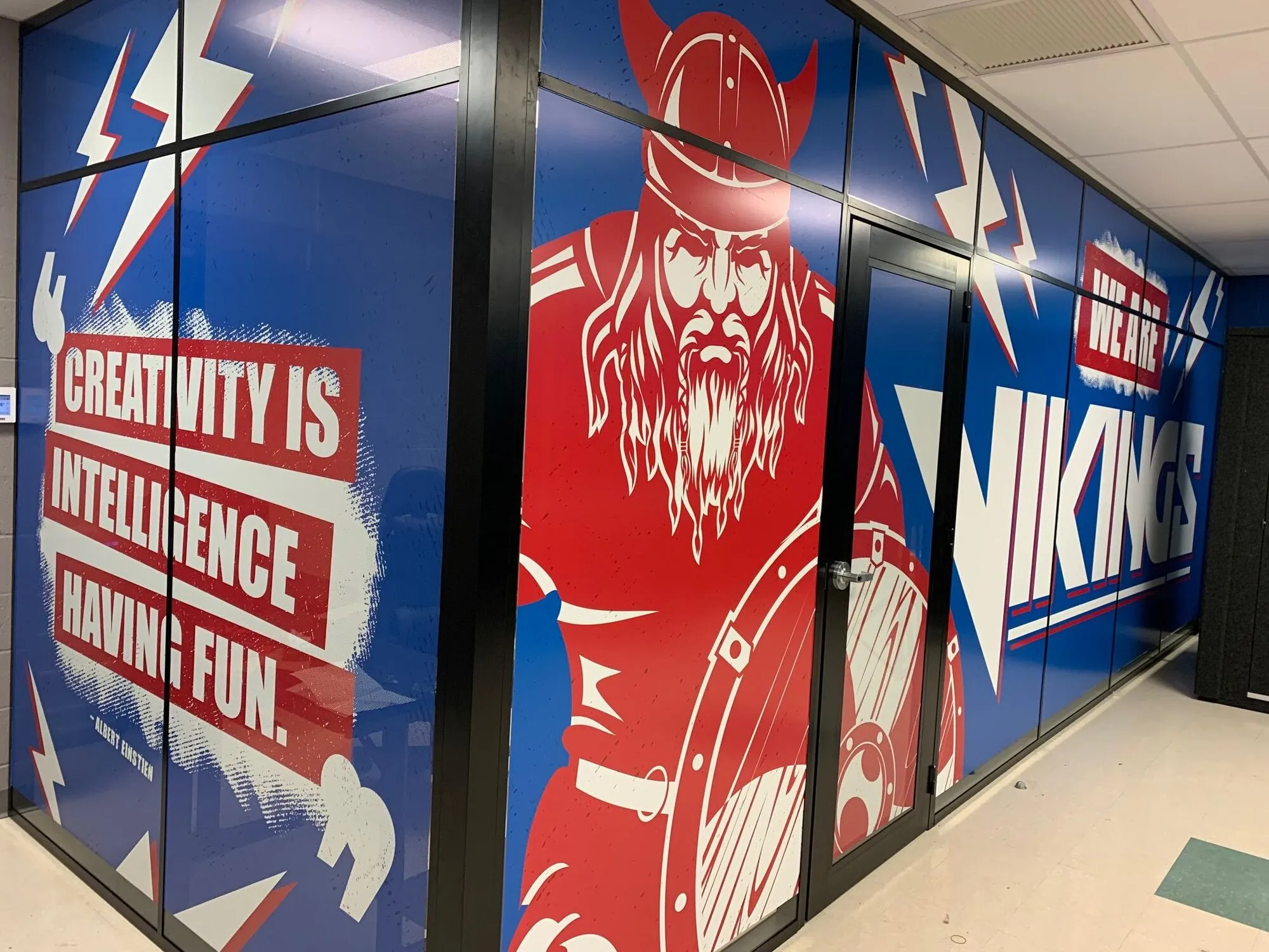 Martino Signs Philadelphia interior with Viking graphic and creativity quote