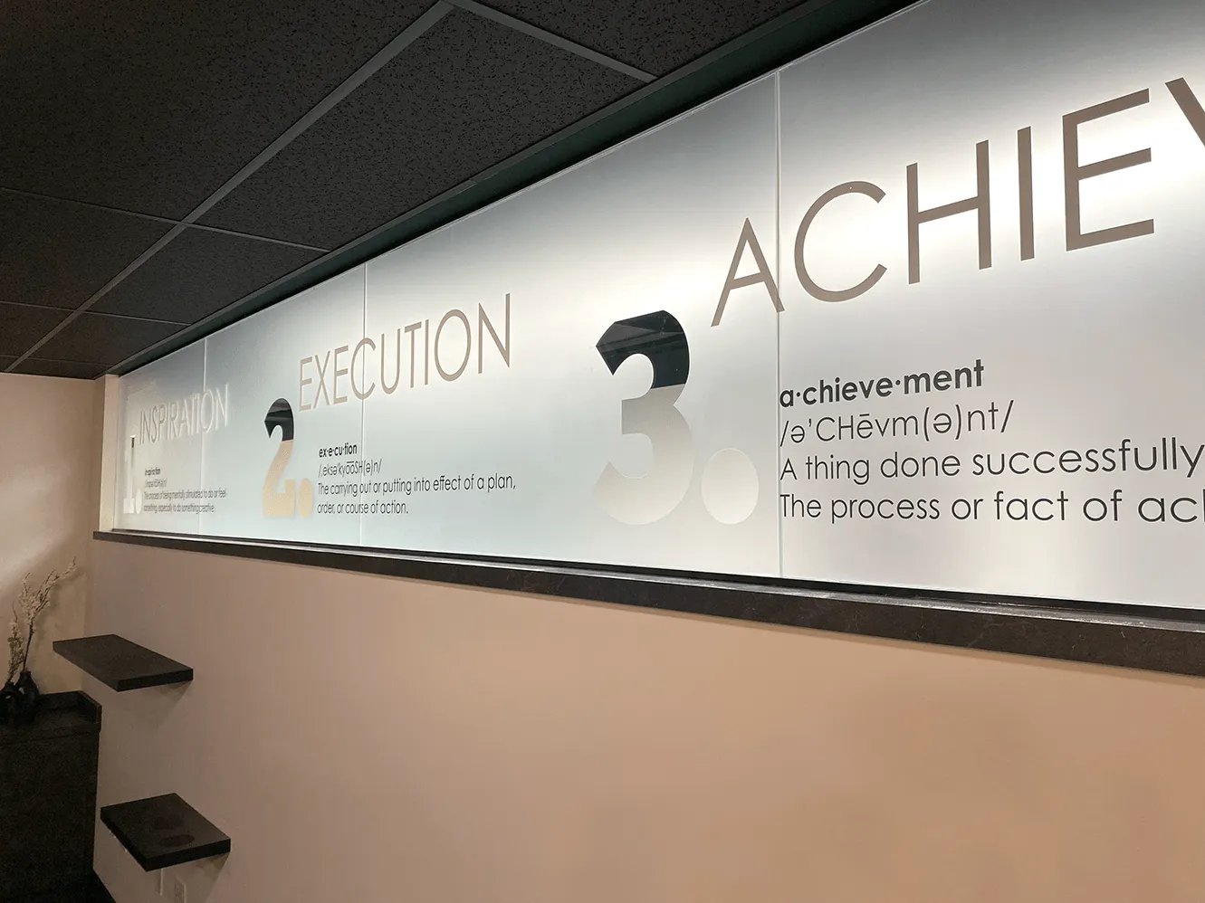 Martino Signs Philadelphia interior display showcasing inspiration, execution, achievement