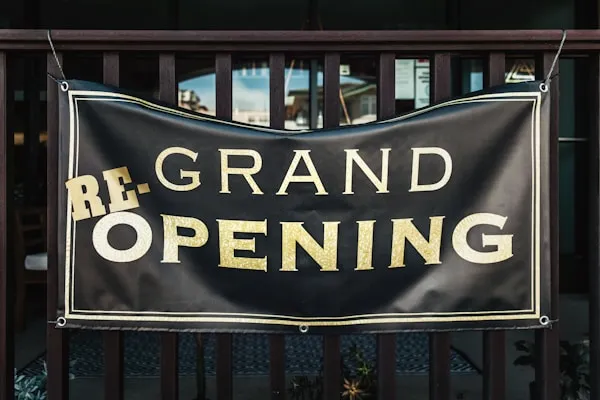 Martino Signs Philadelphia interior and exterior awnings grand reopening banner