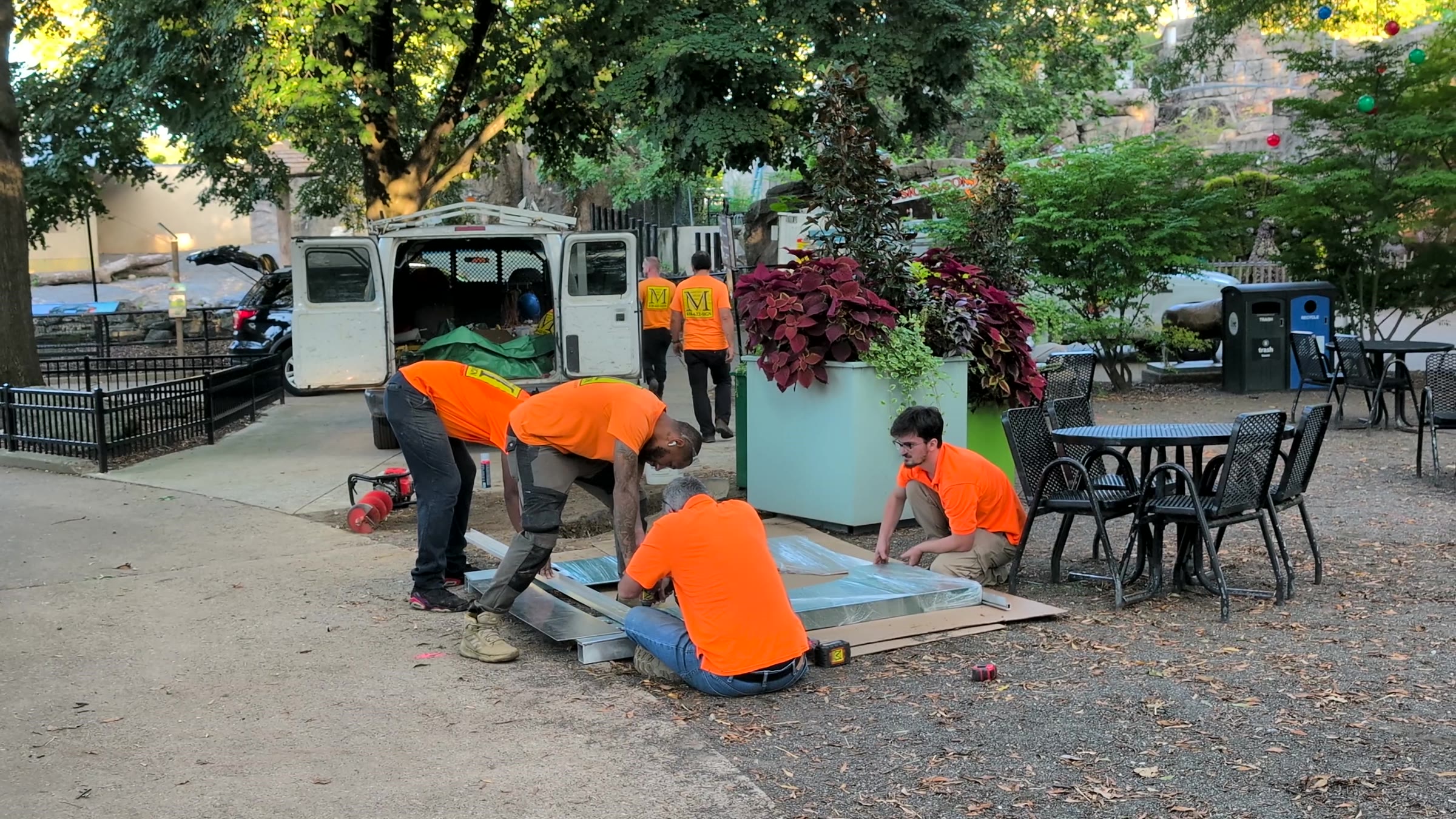 Martino Signs crew setting the Flamingo Cove markers on install evening
