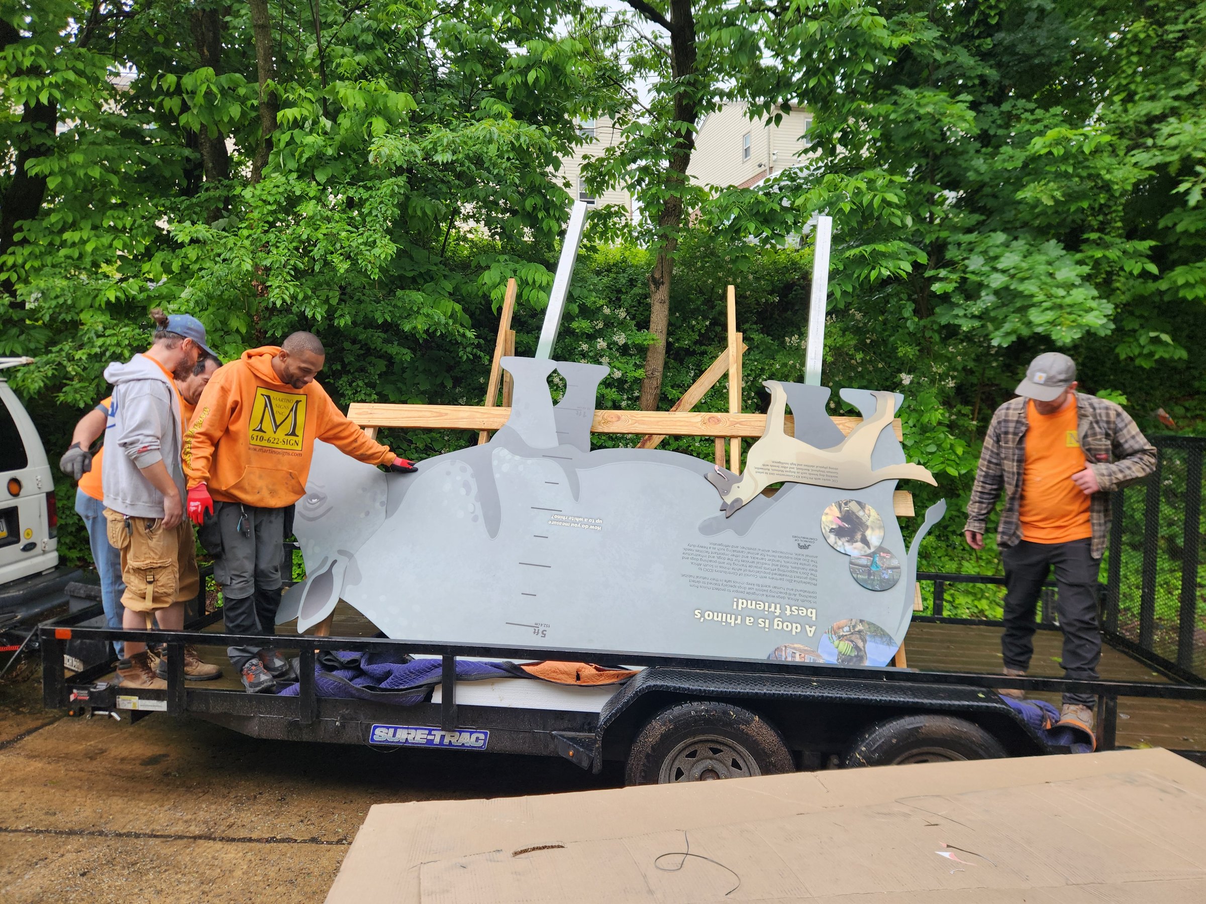 Martino crew on the trailer with the rhino sign before it left the shop