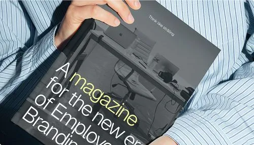 Person holding tablet with design typography