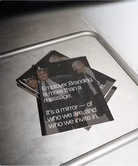 Framed printed materials with typography about employee experience