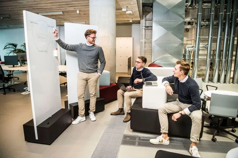 People relaxing in contemporary office