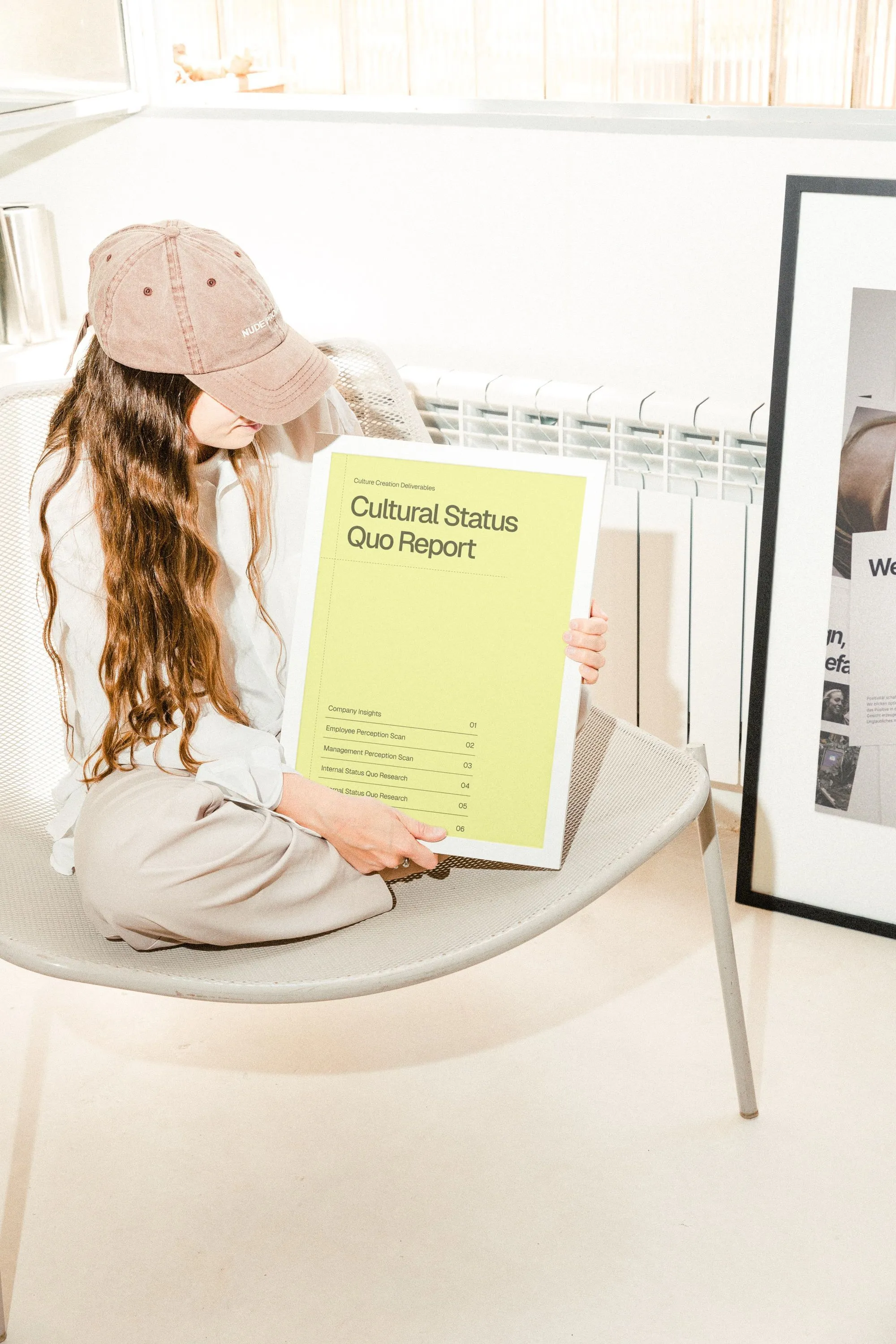 Person reviewing materials on the floor
