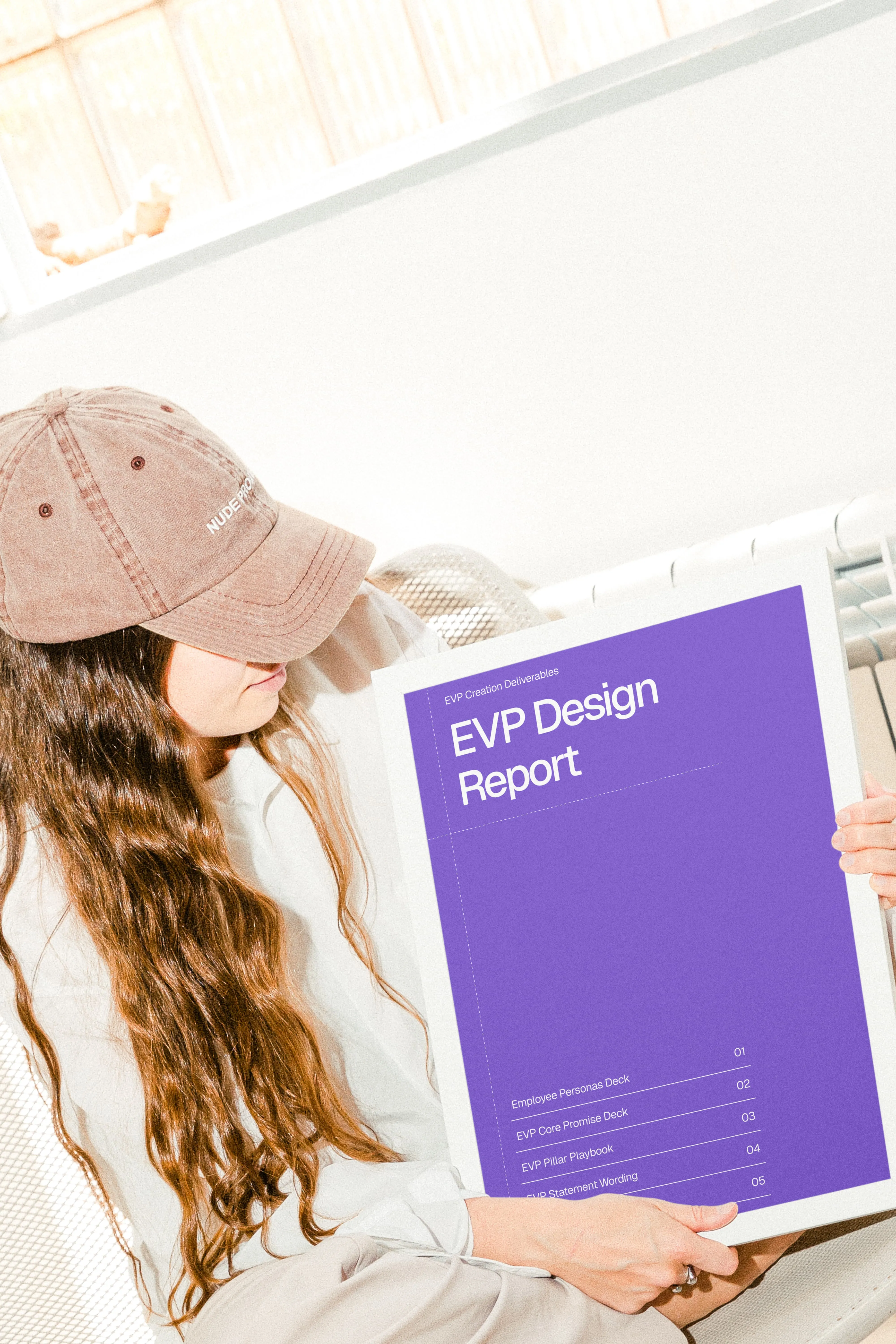 Person holding purple portfolio