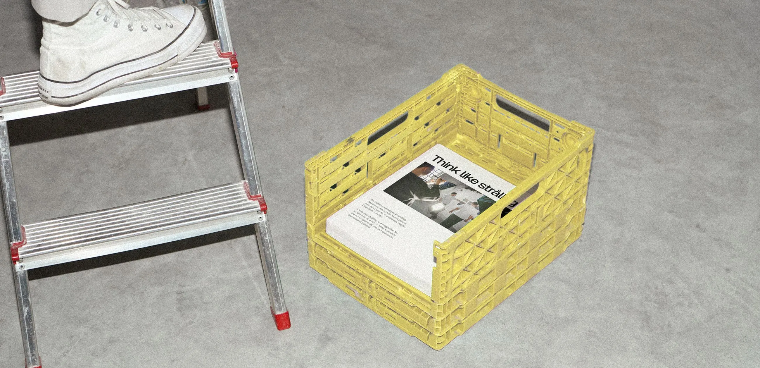 Creative packaging materials including yellow box and printed design elements