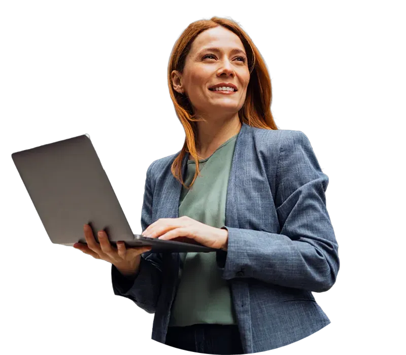 Compliance lead working on a laptop