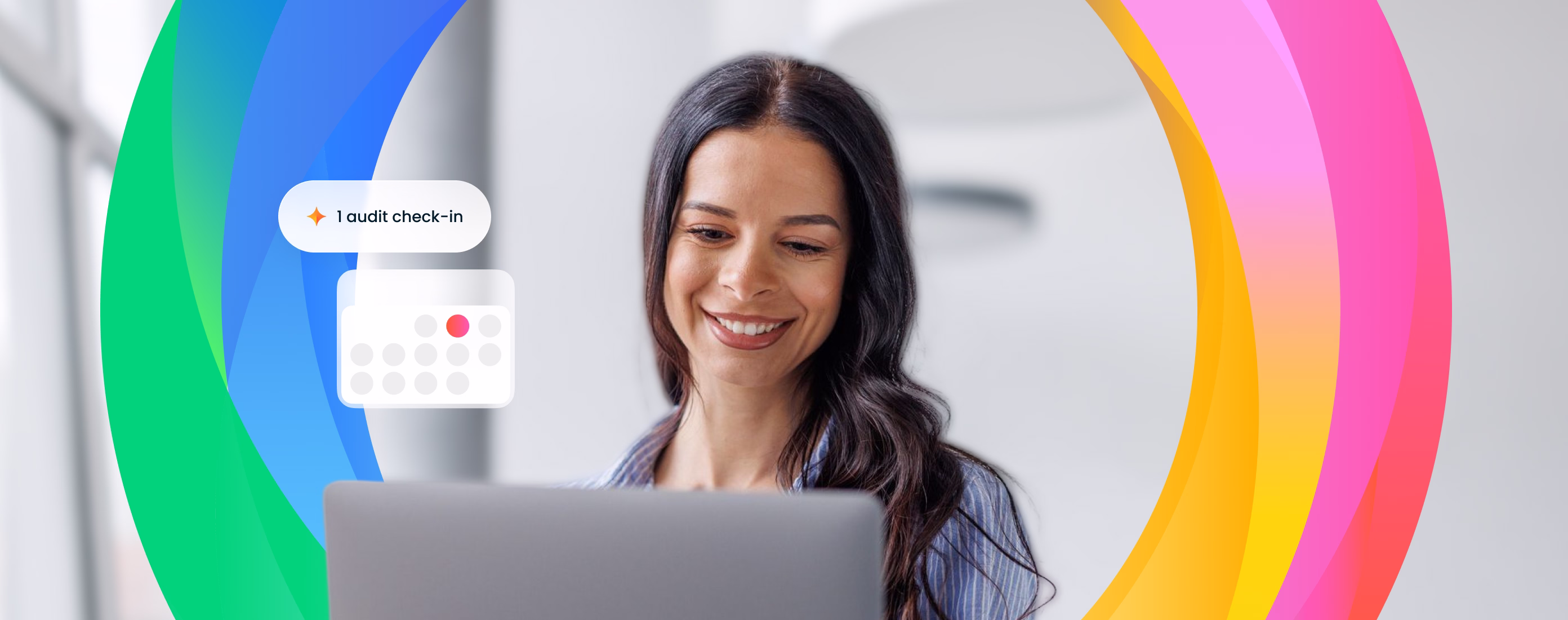 Smiling woman with dark hair looking at a laptop, with colorful blue, green, yellow, orange, and pink curved bands around her and a small calendar icon showing one audit check-in.