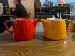 red and yellow teapot