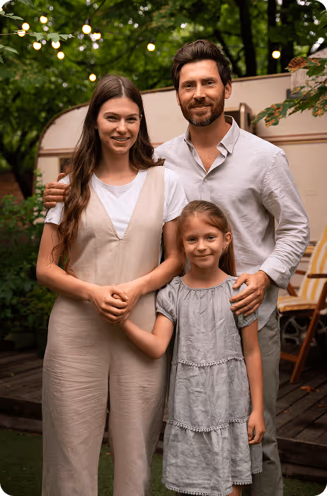 Happy family outside in front of their RV. AOG Group | Allstate