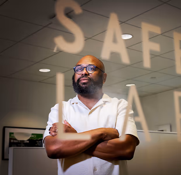 Desmond Upton Patton in SAFELab, focused on trauma recovery strategies and data science for healing.