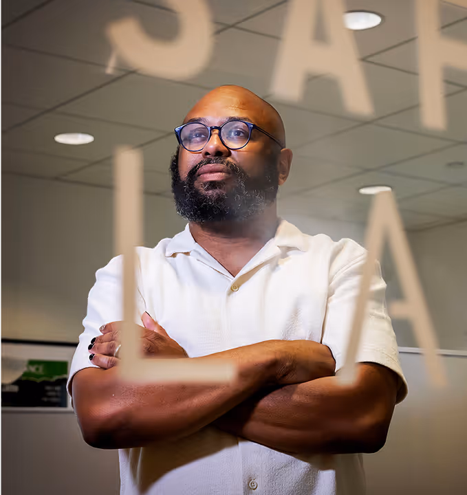 Desmond Upton Patton in SAFELab, focused on trauma recovery strategies and data science for healing.