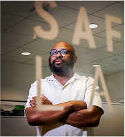 Desmond Upton Patton in SAFELab, focused on trauma recovery strategies and data science for healing.