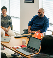 Desmond Upton Patton leads a group discussion on social work innovation and social media well-being.