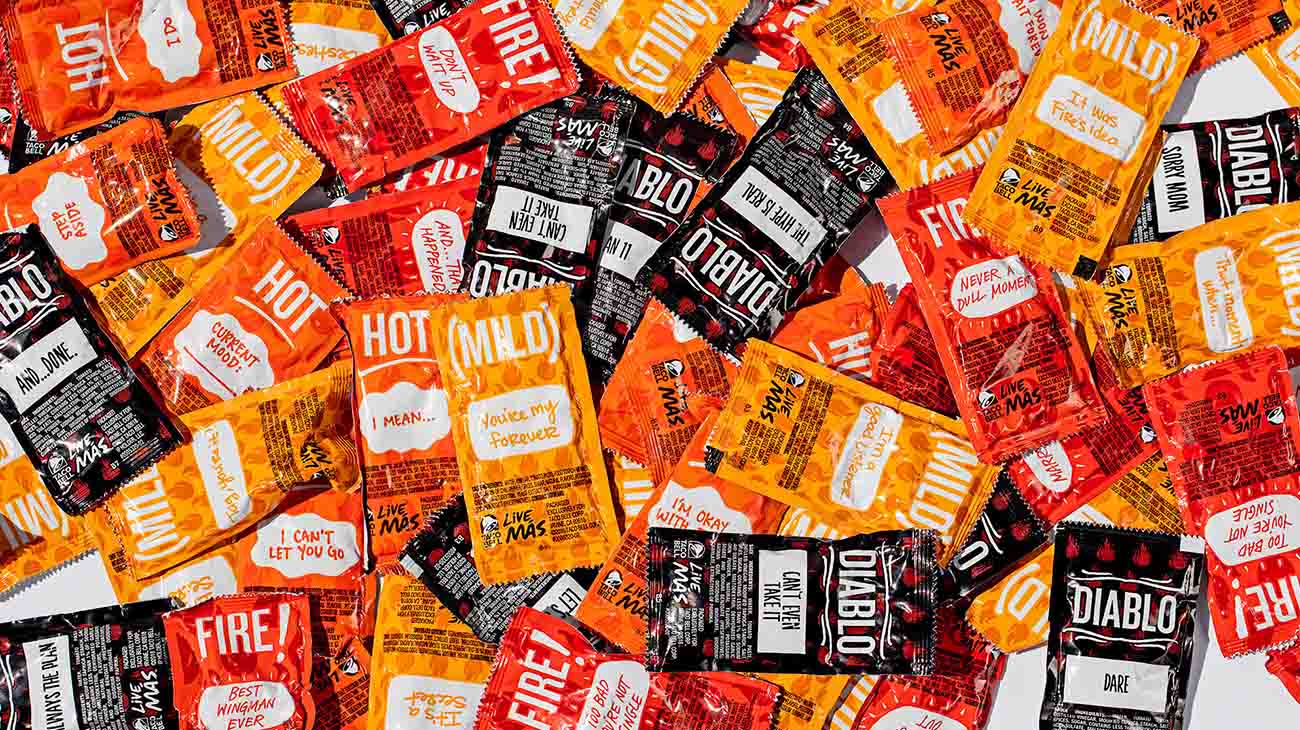 Sauce packet recycling program displaying collected condiment packaging