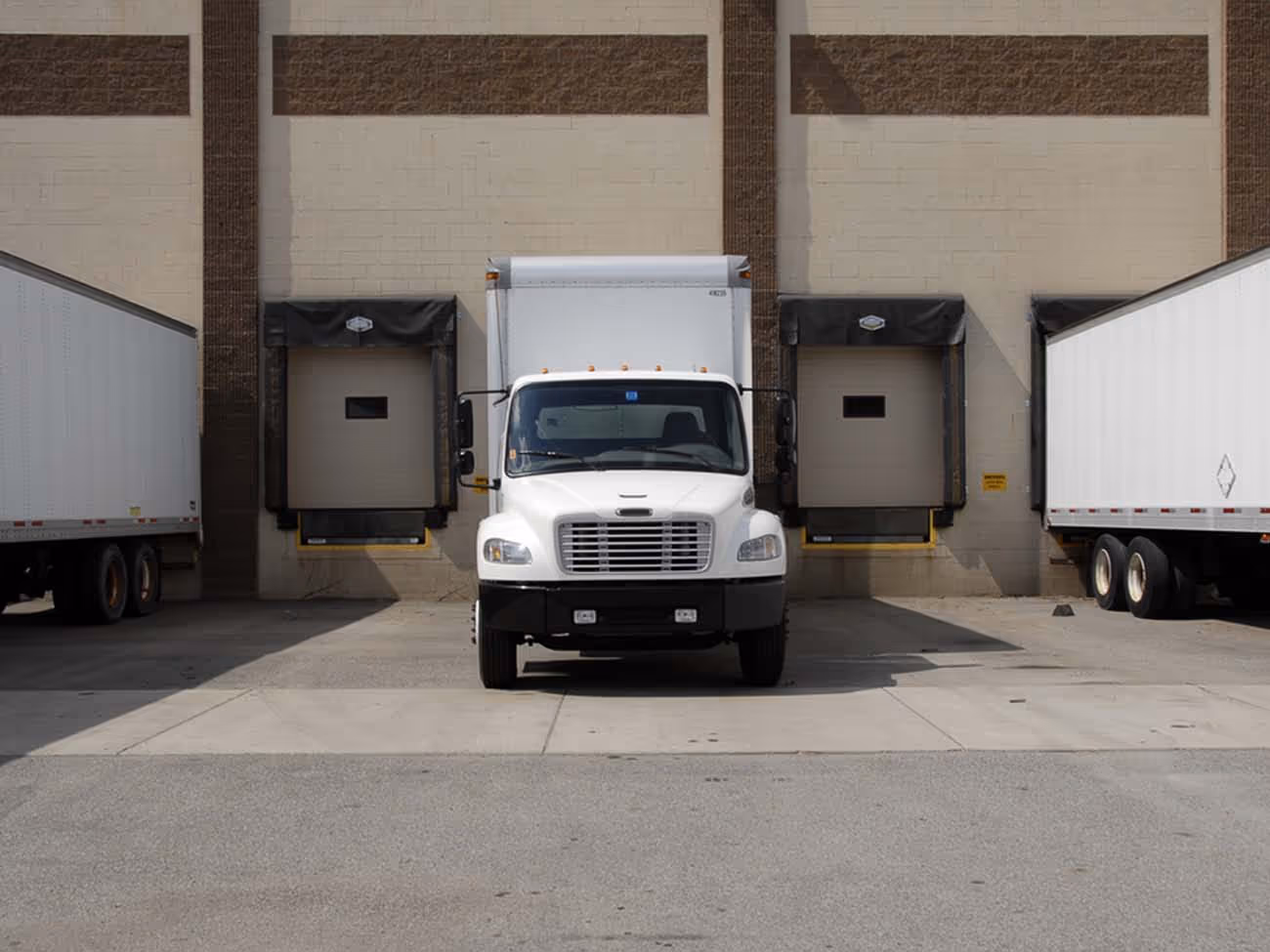 Bulk recycling collection program showing large-scale waste collection containers