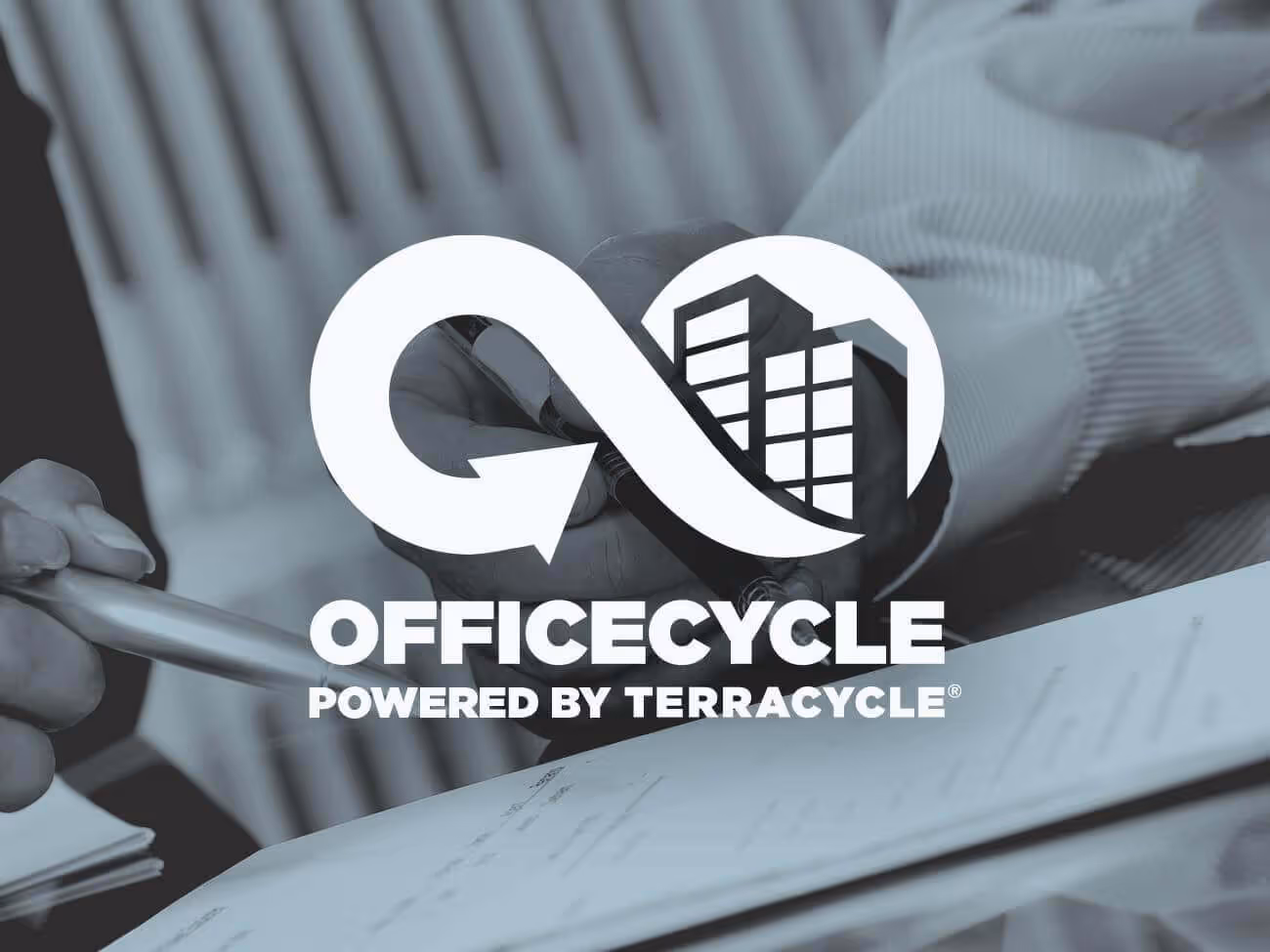 Office recycling program displaying workplace waste collection bins and signage