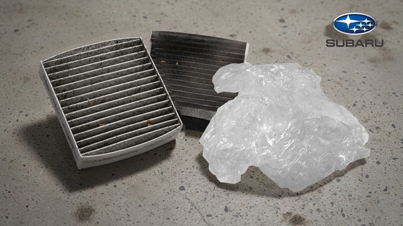 A Subaru vehicle parked near a TerraCycle Zero Waste Box, highlighting their partnership for automotive waste recycling.