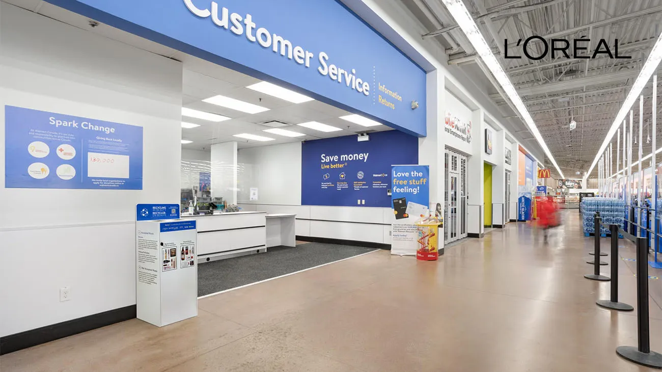L'Oréal beauty products displayed next to a TerraCycle collection box, encouraging in-store recycling.