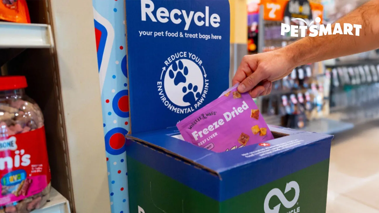 In-store signage at a PetSmart location promoting their partnership with TerraCycle for recycling pet product packaging.