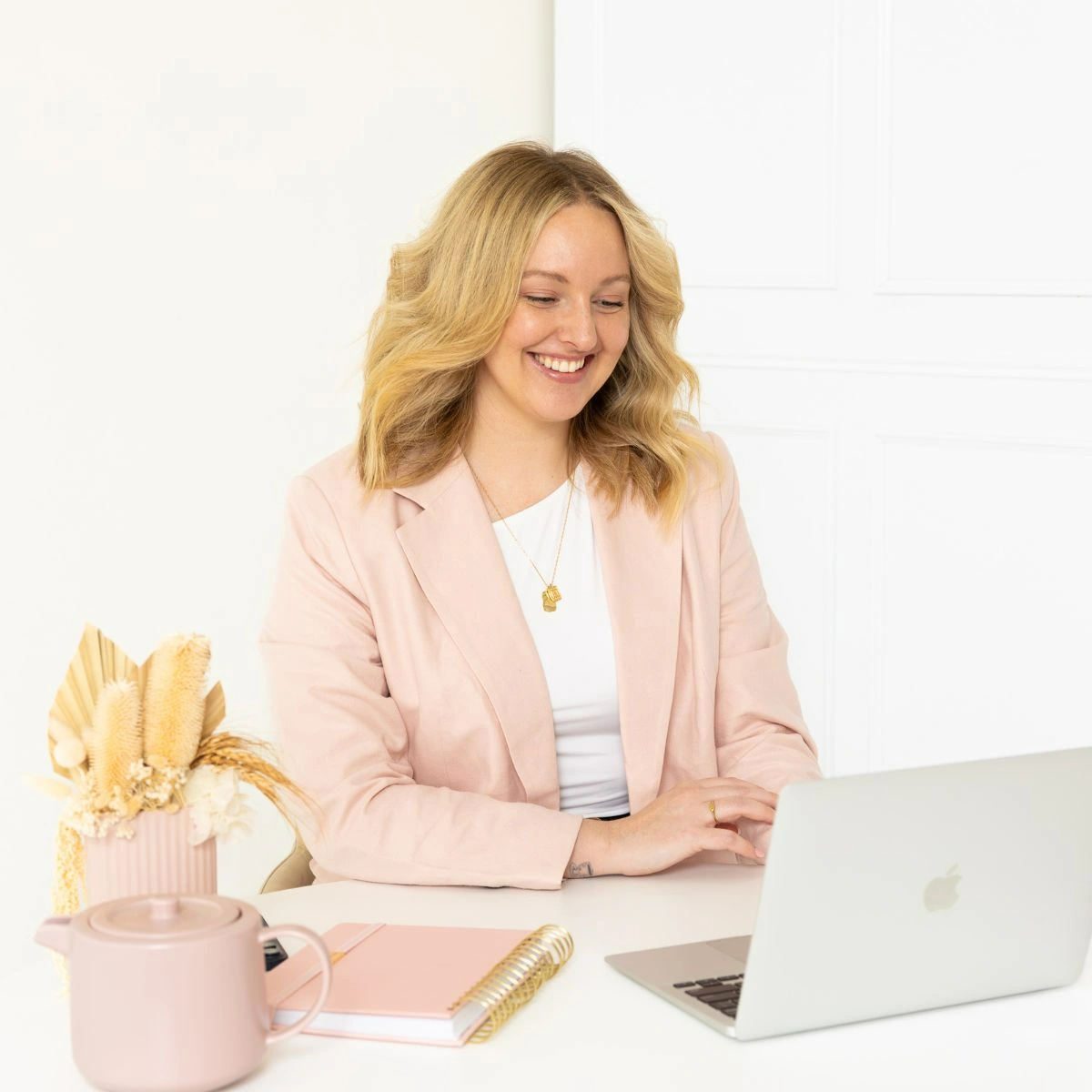 Hayleigh having a virtual meeting with her client