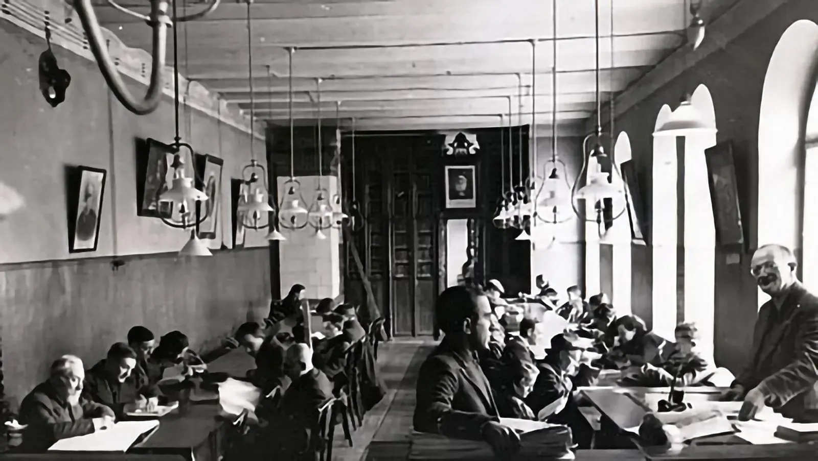 Readers and librarians in the reading room of the Strashun Library, housed in the Vilna synagogue complex and founded by Matisyahu Strashun (1819-1885). (Vilna, 1939.)