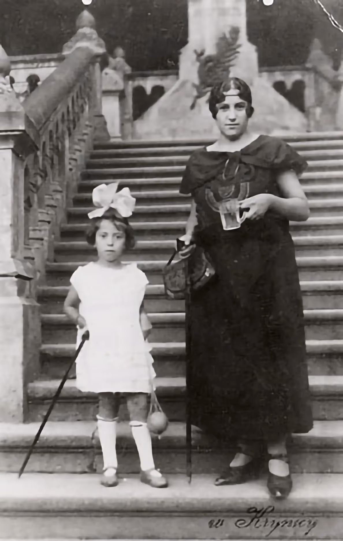Sara Berland with her daughter Felicja, residents of Chelm, pose on the steps of a spa in the countryside. (Krynica, circa 1925.)