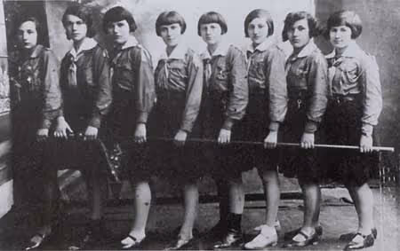 Studio portrait of uniformed girls from Hashomer Hatzair (Young Guard); some young people were attracted to youth groups because of their uniforms, which they could wear with pride (Zolochev, Ukraine, 1920s).