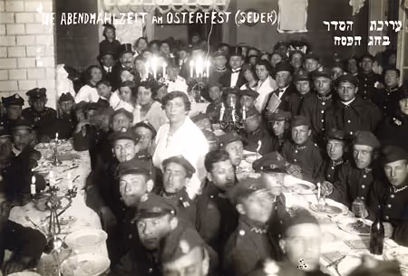 A Passover seder for Jewish soldiers in the Polish Army organized by the charitable Tomkhey Aniyim Association (Warsaw, 1920s).