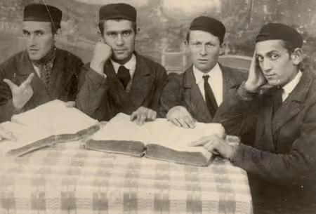 Studio portrait of five young men studying the Talmud (Zolochev, Ukraine, 1930s).